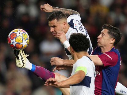 Barcelona's Robert Lewandowski, center, is challenged by PSG's Lucas Hernandez, background, and PSG's Marquinhos, foreground, during the Champions League quarterfinal second leg soccer match between Barcelona and Paris Saint-Germain at the Olimpic Lluis Companys stadium in Barcelona, Spain, Tuesday, April 16, 2024. (AP Photo/Emilio Morenatti)