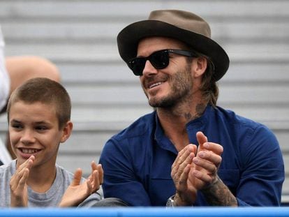 Romeo y David Beckham, en Queen Club.