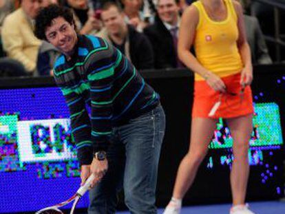 McIlroy, y tras él Wozniacki, en el Madison Square Garden.