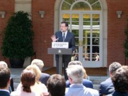 Mariano Rajoy en La Moncloa durante la presentaci&oacute;n de la Ley de Emprendedores a un grupo de empresarios.