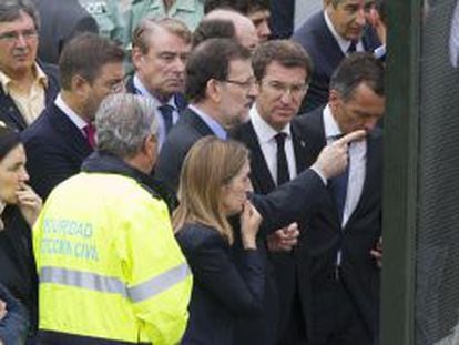 El presidente del Gobierno, Mariano Rajoy, junto con el presidente de la Xunta, Alberto N&uacute;&ntilde;ez Feijoo y la ministra de Fomento, Ana Pastor. 