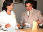 FILE PHOTO: Tunisian President Zine Al-Abidine Ben Ali and his wife Leila Ben Ali (L) vote in Tunis.