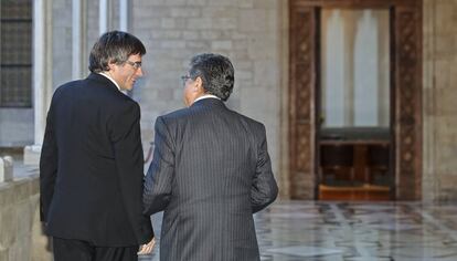 El president de la Generalitat, Carles Puigdemont  i el nou delegat de el Gobierno a Catalunya, Enric Millo.