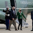 President Joe Biden and first lady Jill Biden are greeted as they walk from Marine One towards Air Force One at Andrews Air Force Base, Md., Friday, Feb. 26, 2021. They are en route to Houston to survey damage caused by severe winter weather and encourage people to get their coronavirus shots. (AP Photo/Susan Walsh)