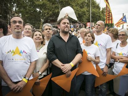 Oriol Junqueras, en el centro, en una manifestación independentista, junto a Carme Forcadell y Raül Romeva (a su izquierda).