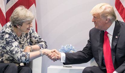 El presidente de EE UU, Donald Trump, y la primera ministra de Reino Unido, Theresa May, en el G20 en Hamburgo. Matt Cardy/Getty Images