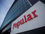 FILE PHOTO: The logo of Banco Popular is seen on its headquarter in Lisbon