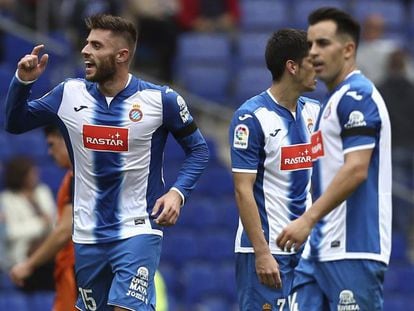 David López, Jurado y Gerard Moreno celebran un gol del Espanyol.