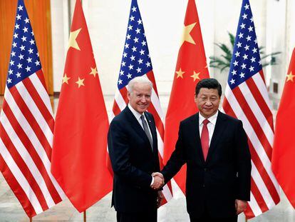 Xi Jinping y Joe Biden, en Pekín en 2013, cuando este era vicepresidente de Barack Obama.