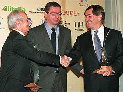 Alfonso Cortina y Vittorio Mincato con Ruiz-Gallardón