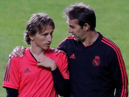 Modric junto a Lopetegui.