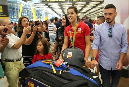 La campeona olímpica en Badmintón Carolina Marín, a su llegada al Aeropuerto Adolfo Suárez Madrid-Barajas. 