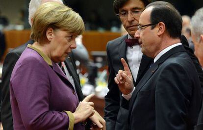 Merkel y Hollande, este jueves en Bruselas.