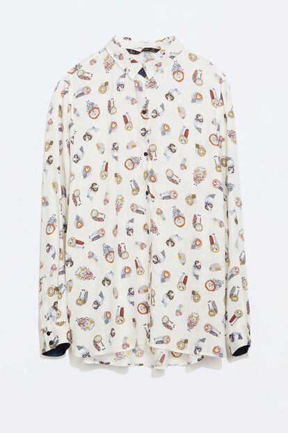 Blusa de Zara con estampado de búhos (25,95 euros).