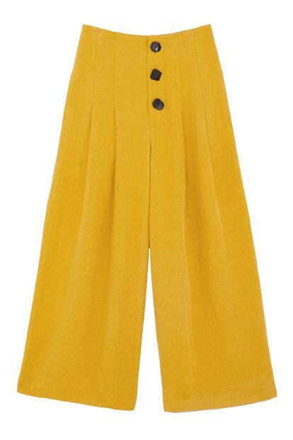 Pantalón amplio de Zara con pliegues y detalle de botones (39,95 euros).