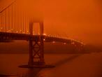 -- AFP PICTURES OF THE YEAR 2020 --

Cars drive along the Golden Gate Bridge under an orange smoke filled sky at midday in San Francisco, California on September 9, 2020. - More than 300,000 acres are burning across the northwestern state including 35 major wildfires, with at least five towns "substantially destroyed" and mass evacuations taking place. (Photo by Harold POSTIC / AFP)