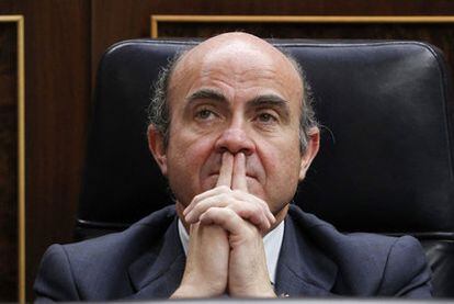 El ministro de Economía y Competitividad, Luis de Guindos, el pasado 27 de diciembre en el Congreso de los Diputados.