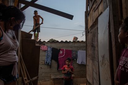 A family in the 'Esperança' occupation in Osasco, Brazil.