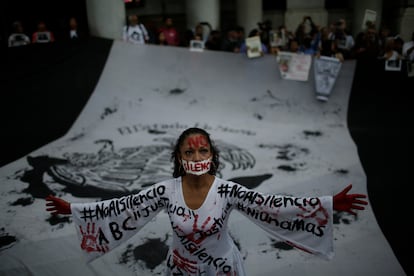 A woman participates in a protest against violence against journalists in Mexico City.