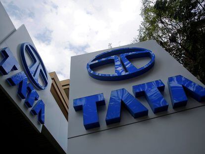 FILE PHOTO: Tata Motors logos are seen at their flagship showroom before the announcement of their Q3 results in Mumbai