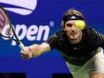 Stefanos Tsitsipas, of Greece, returns a shot against Adrian Mannarino, of France, during the second round of the US Open tennis championships, Wednesday, Sept. 1, 2021, in New York. (AP Photo/Frank Franklin II)