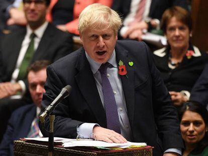 A handout picture released by the UK Parliament shows Britain's Prime Minister Boris Johnson speaking during the weekly Prime Minister's Questions (PMQs) in the House of Commons in London on October 30, 2019. - The UK parliament on Thursday narrowly approved Prime Minister Boris Johnson's annual legislative programme, delivering his minority government a symbolic win as he pushed for a snap general election. Parliament's lower House of Commons approved the proposal, which does not directly deal with the Brexit crisis, by 310 to 294 votes. (Photo by JESSICA TAYLOR / various sources / AFP) / RESTRICTED TO EDITORIAL USE - MANDATORY CREDIT