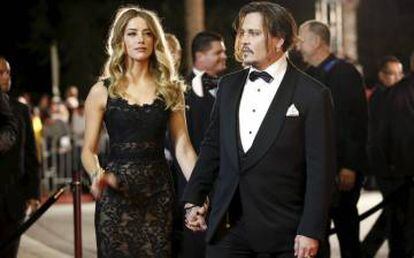 Johnny Deep y su exmujer Amber Heard en un estreno.