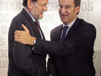 Rajoy, junto a Feij&oacute;o, ayer en G&eacute;nova. Fotograf&iacute;a facilitada por el PP.