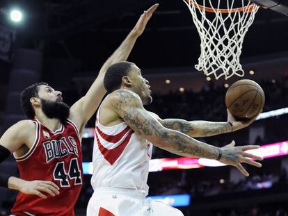 Nikola Mirotic y Michael Beasley.