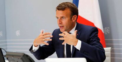 El presidente francés, Emmanuel Macron en un encuentro con el director general de la OMS