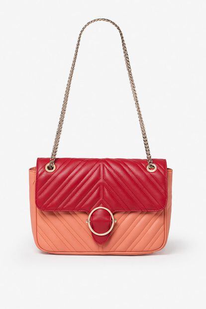 Bolso bandolera bicolor de Uterqüe (150 euros). Aportará un toque de energía a cualquier look.