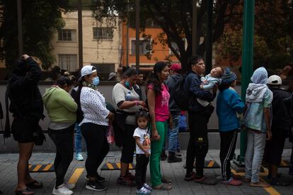 Central American migrants demonstrate at the headquarters of the National Migration Institute (INM) to regularize their situation in the country, on Monday, in Mexico City.
