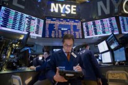 Traders en el parqu&eacute; del NYSE. 