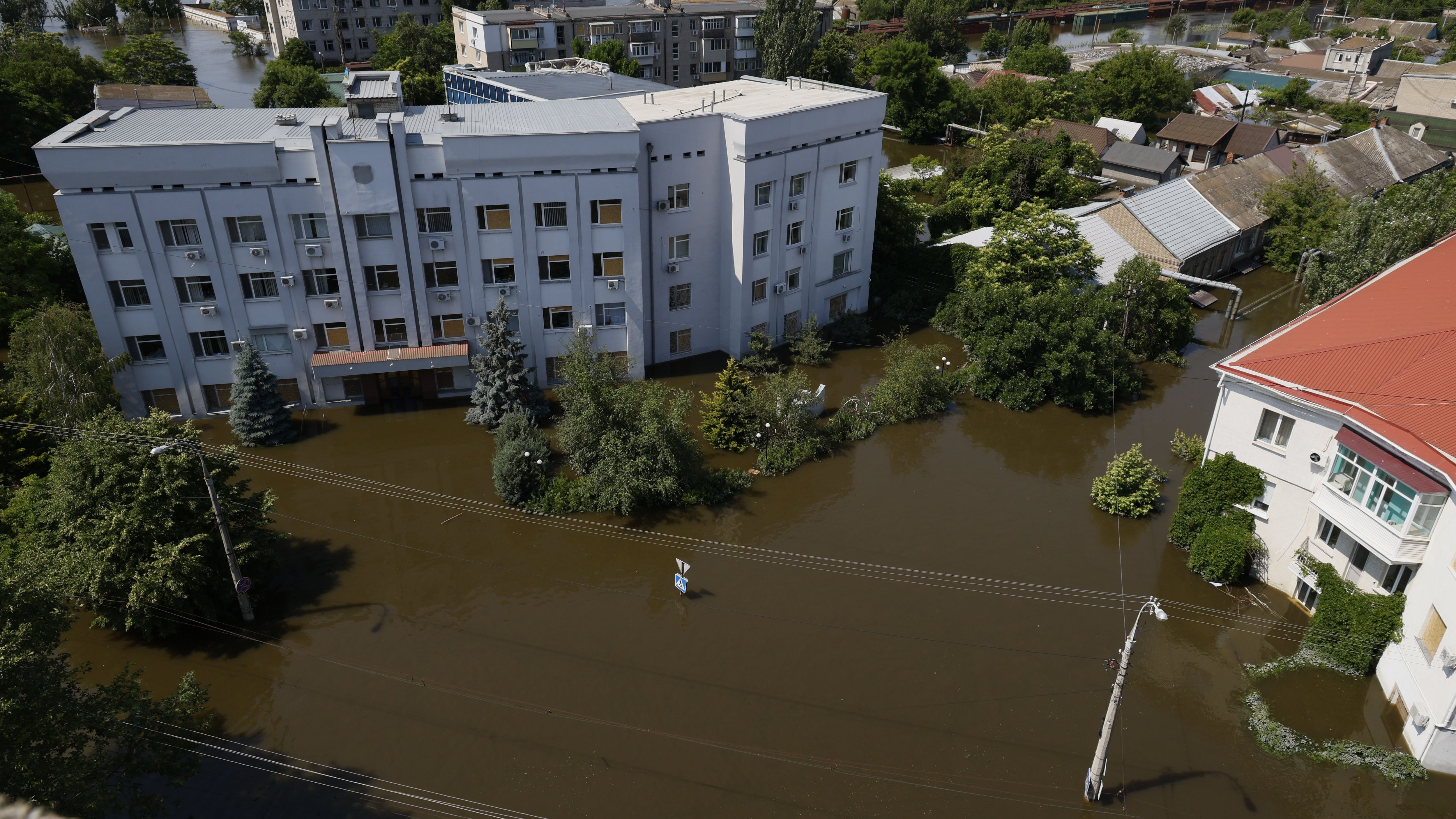 KHERSON, UKRAINE - JUNE 9: A general view of a flooded square on June 9, 2023 in Kherson, Ukraine.  Early Tuesday, the Kakhovka dam and hydroelectric power plant, which sit on the Dnipro river in the southern Kherson region, were destroyed, forcing downstream communities to evacuate do to risk of flooding. The cause of the dam's collapse is not yet confirmed, with Russia and Ukraine accusing each other of its destruction. The Dnipro river has served as a frontline between the warring armies following Russia's retreat from Kherson and surrounding areas last autumn. The dam and plant had been under the control of Russia, which occupies a swath of land south and southeast of the river. (Photo by Alex Babenko/Getty Images)