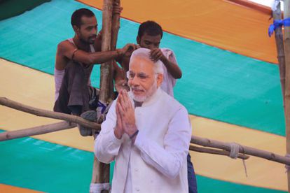 El estudio experimentó con votantes indios en las elecciones de 2014, en las que ganó Narendra Modi, actual primer ministro indio. En la imagen, partidarios de Modi con su efigie.