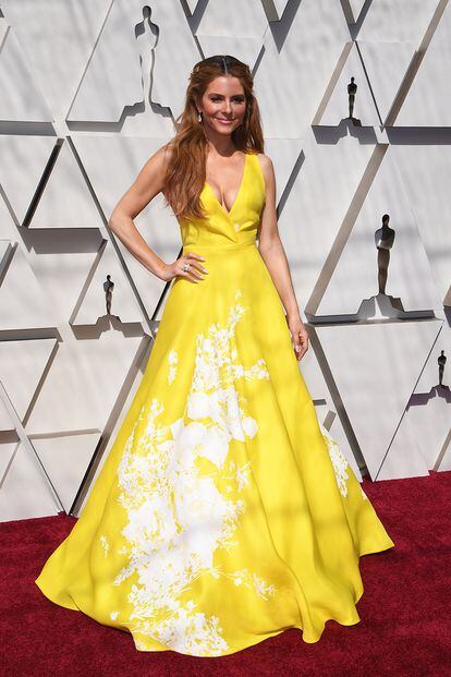 La actriz y presentadora Maria Menounos eligió un vestido amarillo de la diseñadora griega Celia Kritharioti.