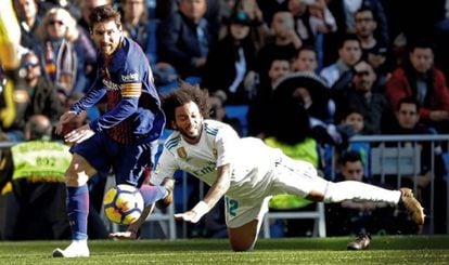Leo Messi y Marcelo en el último clásico disputado en el Bernabéu.