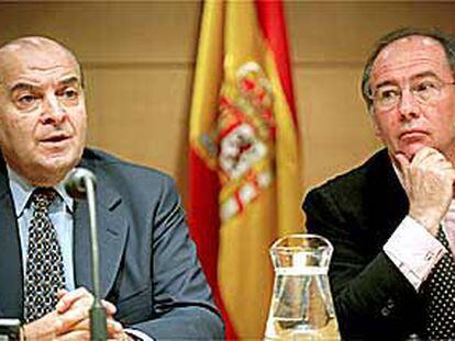 Domingo Cavallo (a la izquierda) y Rodrigo Rato, ayer en su encuentro en Madrid.