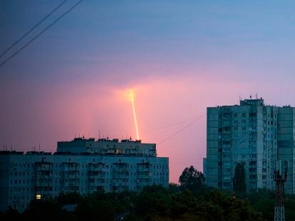 A Russian rocket launched toward Ukraine from Russia's Belgorod region is seen at dawn in Kharkiv, Ukraine, Thursday, Aug. 11, 2022. (AP Photo/Vadim Belikov)