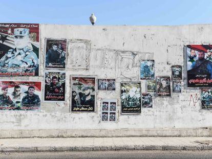 Un muro de Damasco con fotos de soldados del r&eacute;gimen fallecidos.