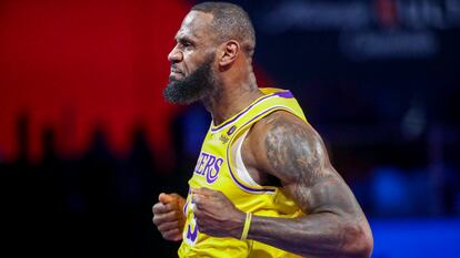 Los Angeles Lakers forward LeBron James (23) reacts after making a basket against the Indiana Pacers during the first half of the championship game in the NBA basketball In-Season Tournament on Saturday, Dec. 9, 2023, in Las Vegas. (AP Photo/Ian Maule)