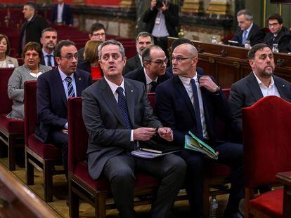 Los políticos catalanes Joaquim Forn, Raül Romeva y Oriol Junqueras, acusados de sedición, en el Tribunal Supremo durante el juicio (2019).