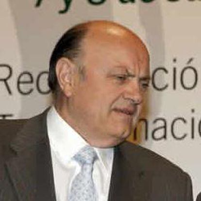 El presidente de la CECA, Juan Ramón Quintás, junto al de Caja Madrid, Miguel Blesa