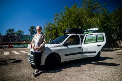 Leonor, victim of church abuse, next to her car converted into a caravan.