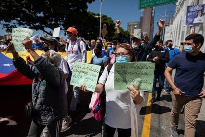 Pensioners and workers march to demand better payments on November 10 in Caracas.
