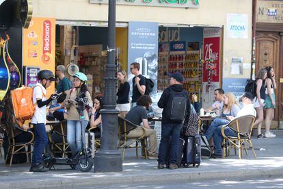 Atocha street in Madrid, whose pedestrian extension is full of terraces.