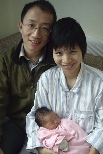 Hu Jia, con su esposa, Zeng Jingyan, y su hija.