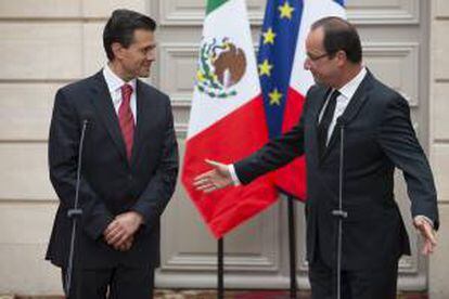 El presidente francés François Hollande (dcha) y el presidente electo de México, Enrique Peña Nieto. EFE/Archivo