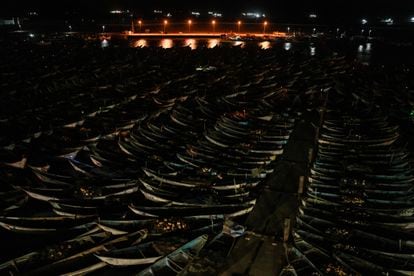 General view of the Port of Nouadhibou at night, where hundreds of traditional fishing boats are stored.