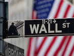  The Wall Street sign is pictured at the New York Stock exchange (NYSE) in the Manhattan borough of New York City, New York, U.S., March 9, 2020. REUTERS/Carlo Allegri/File Photo/File Photo